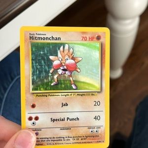 Wear and tear holographic hitmonchan Pokemon card